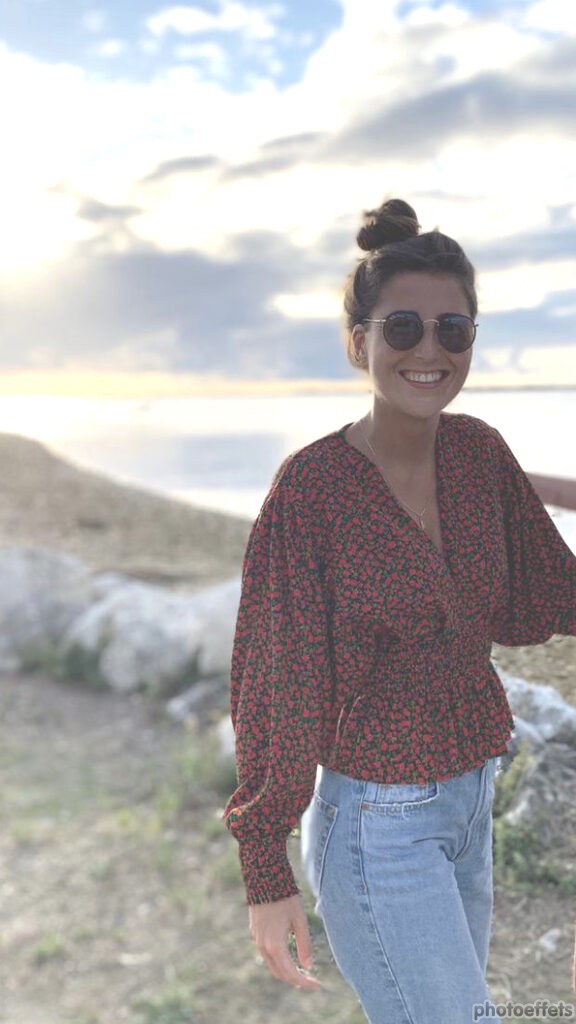 Grapefruit slice atop a pile of other slices